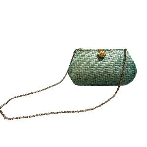 Vintage Vanessa mint green wicker basket clutch with
Seashell Hardware. Vintage